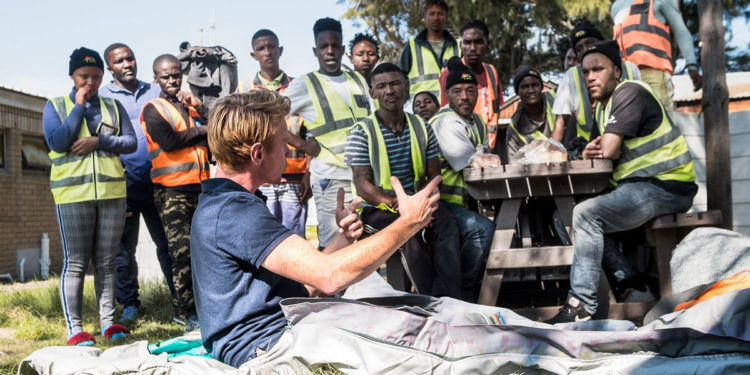 Dutch designer sews “sheltersuits” to keep homeless people warm in winter