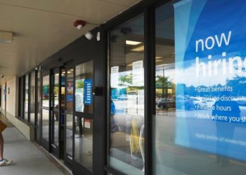 US jobless claims hit a pandemic low as hiring strengthens