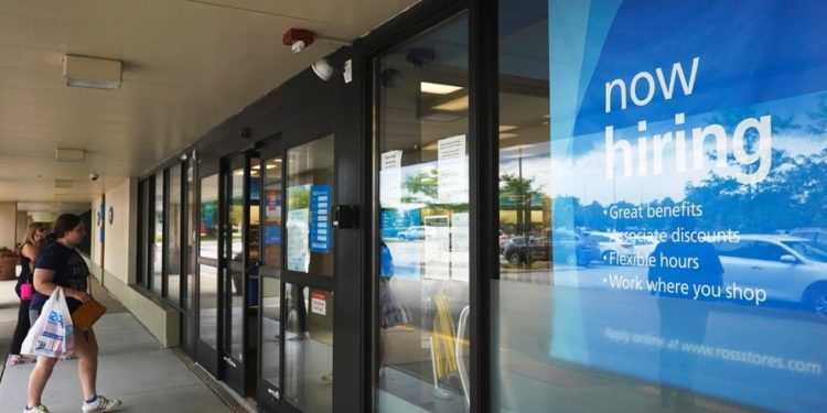 US jobless claims hit a pandemic low as hiring strengthens